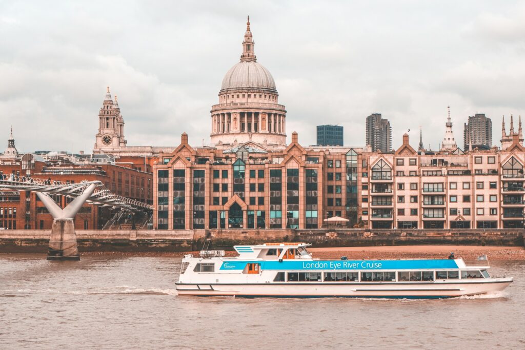 A London Eye River Cruise sailing on the River Thames in front of St Paul's Cathedral.