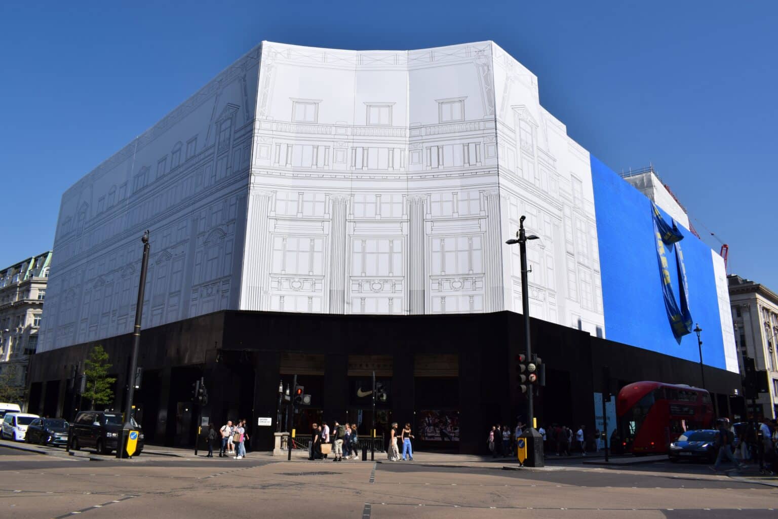 The IKEA store on Oxford Street with a massive IKEA bag hanging down the side.