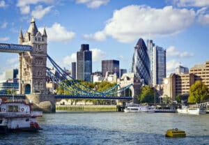 London skyline featuring Tower Bridge, Tower of London, and The Gherkin.