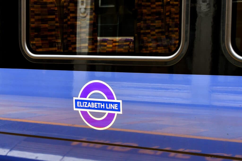 Close up view of the side of a train on the new Elizabeth Line at London Paddington.