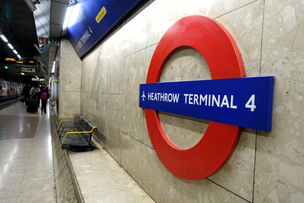 Tube Heathrow Terminal 4 signage at Heathrow Airport.